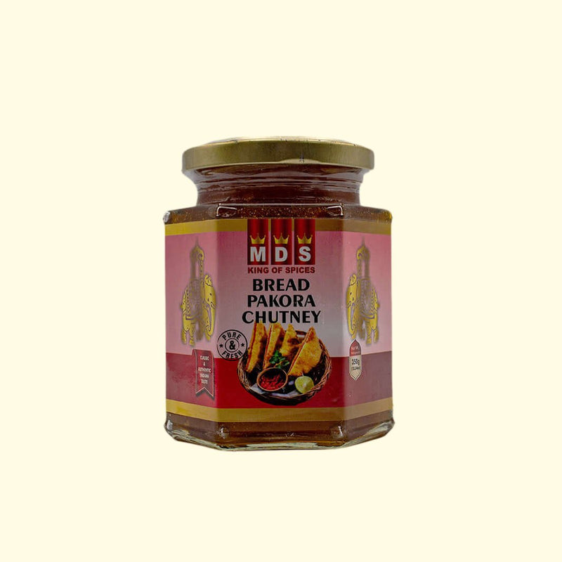 MDS Bread Pakroa Chutney is carefully crafted with traditional Indian spices, giving it a distinct, authentic flavor. This 350g chutney pairs perfectly with savory dishes or can be used to add a bit of zest to sandwiches and wraps. Enjoy the robust flavor of this classic condiment and tantalize your taste buds.