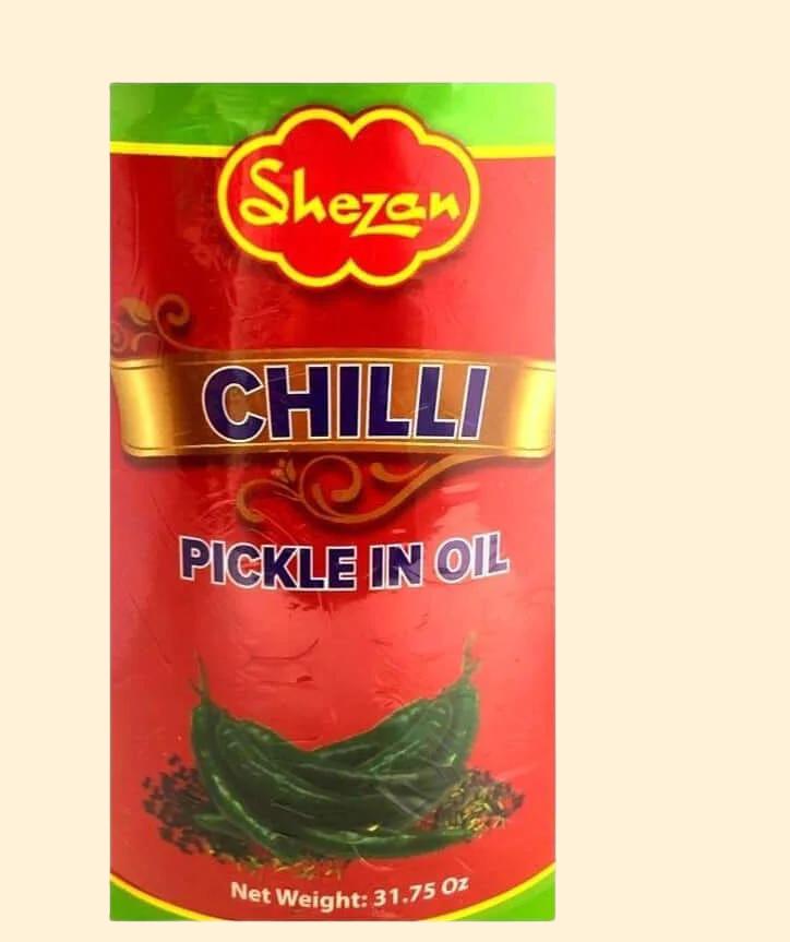 Shezan Chilli Pickle in oil 900g gives you a delicious spicy flavor that will elevate your meals. This 900g jar is packed with a flavorful blend of chili and other spices and oil for a zesty, spicy taste. Perfect for adding a kick to your favorite dishes.