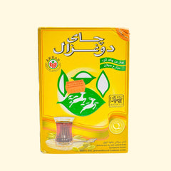 Brew a cup of Akbar Do Ghazal Black Tea with Cardamom Aroma 500g for a perfect blend of flavor and aroma. This tea's deep flavors are balanced with a unique cardamom aroma, creating a smooth, inviting cup of tea. This 500g jar will make many cups of tea to enjoy