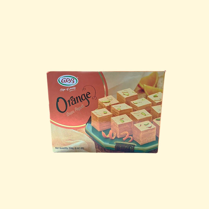 Treat your taste buds to a party with GRB's Orange Soan Papdi 250g! This crunchy, orange-flavored snack is sure to be a hit - you won't be able to get enough! Enjoy the zesty flavor and crumbly texture, with just the right amount of sweetness. Soan Papdi - the perfect snack for a flavor fiesta!