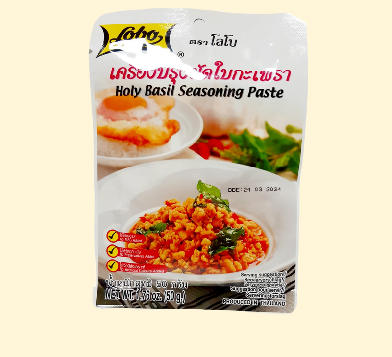 Introducing Lobo - a spicy and flavorful holy basil seasoning paste that's sure to give your dishes a kick! Every spoonful of this goodness is packed with robust aroma and zesty flavor, adding a delicious twist to all your favorite recipes. Try it out and your taste buds will be saying "WOW!"