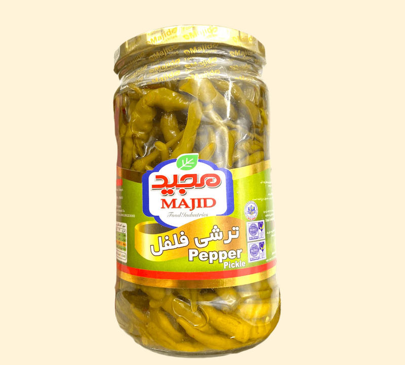 Majid Pepper Pickle 1Kg is a delicious and spicy condiment made from a blend of fresh, locally-sourced peppers. The crunchy pickles are packed with flavor, with an intense heat that is sure to add a kick to your favorite dishes. The convenient 1Kg jar is ideal for stocking up, so you’ll never run out of this delicious pickle again!