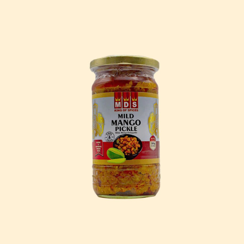 MDS Mild Mango Pickle brings you the perfect balance of sweet and savory flavors. Crafted with hand-selected, fresh mangoes, this pickle is sure to add a hint of flavor to any meal or snack. Thanks to its mild spice level, it's great for the whole family. Enjoy 300g of delicious pickle with every order.