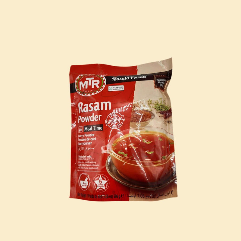 Introducing MTR Rasam Powder, a powerful flavor enhancer sure to leave your taste buds singing! This traditional blend of spices, herbs, and lentils will give your recipes a delicious zing, elevating them from ordinary to extraordinary. Make your meals more exciting with MTR!