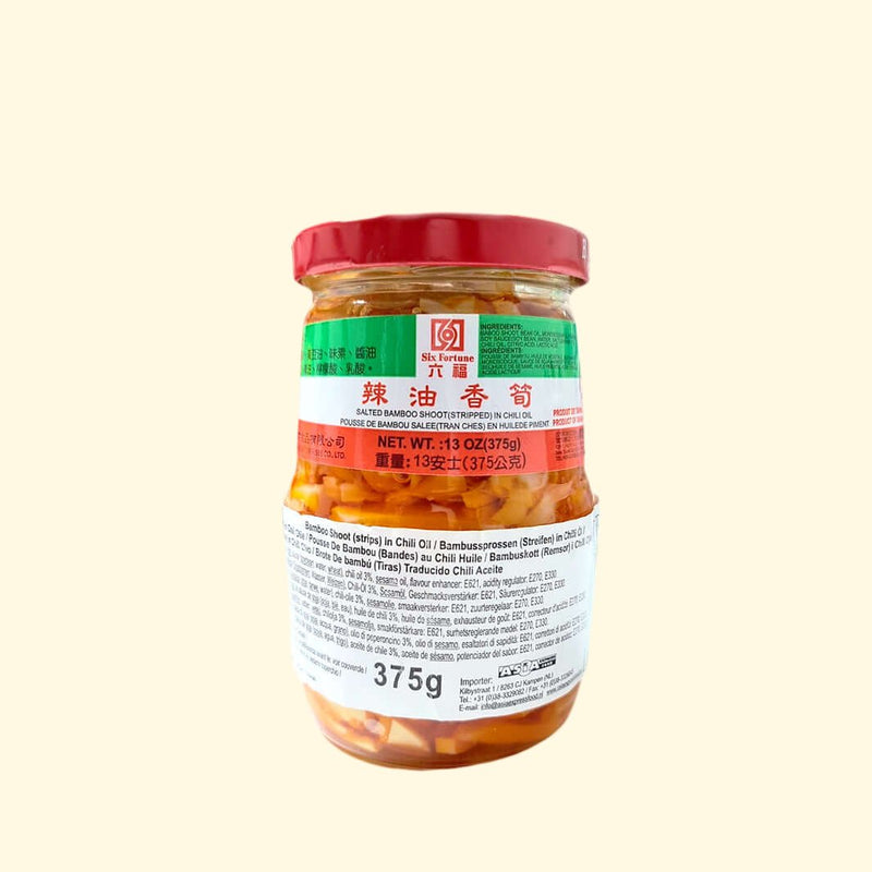 Spice up your life with Six Fortune's Bamboo Shoot (strips) in Chili Oil! Ready to be enjoyed in 375g, it's a mouth-watering choice that's sure to add some kick to your kitchen! Just heat and serve for a delicious, hot and spicy dish that'll have you coming back for more!