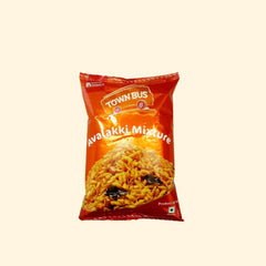 Town Bus Avalakki Mixture is a delicious, crunchy combination of avalakki, peanuts, cashews, almonds, coriander, and spices. This mix of roasted ingredients is the perfect snack for any occasion. Enjoy the classic, savory flavor and crunch of Town Bus Avalakki Mixture today!